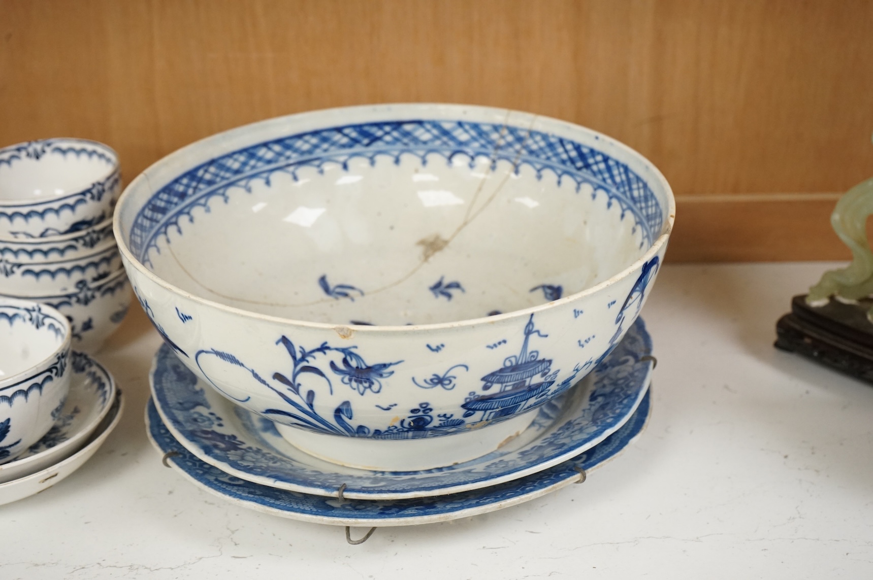 An 18th century blue and white Worcester jug and assorted Booths Worcester style tea wares, largest 24cm high